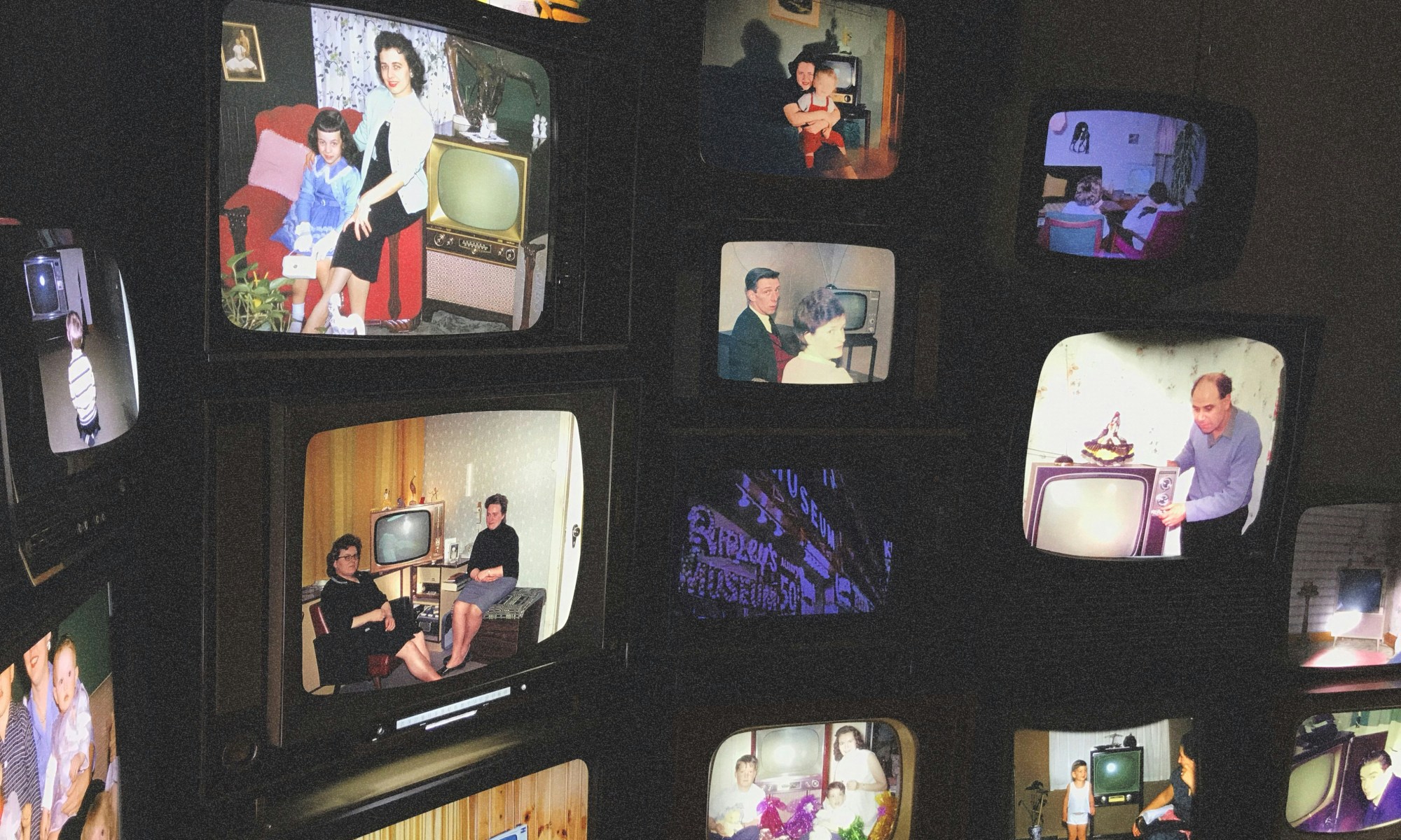 several old-fashioned tv screens